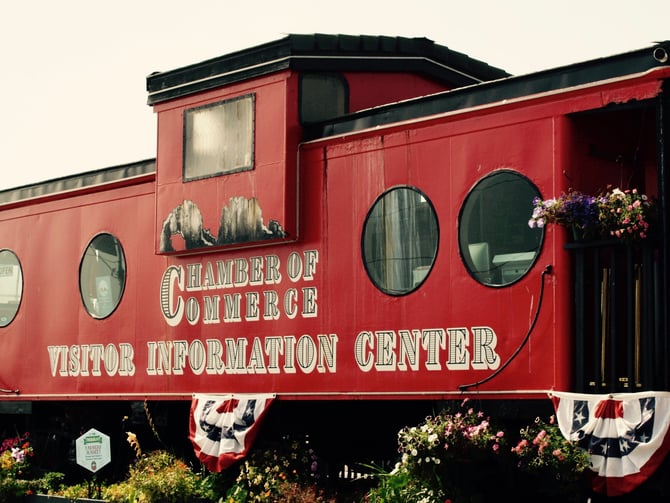 Red caboose visitor information center at Rockaway Beach wayside